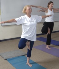 Women in yoga posture.