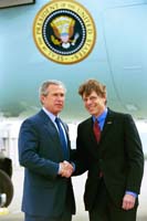 President George W. Bush met Steve Houck upon arrival in Santa Clara, California, on Friday, May 2, 2003. Since joining Salesforce.com in 2002, Houck has spent more than 125 hours serving his community with support from his employer. 