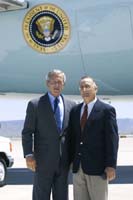 President George W. Bush met Dr. Tom Hesch upon arrival in Albuquerque, New Mexico, on Wednesday, August 11, 2004.  Hesch, a dentist, is an active volunteer with Donated Dental Services (DDS) of New Mexico.