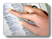 photo of a person’s hand looking through the treatment directory