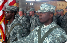 photo of National Guard members standing at attention in Iraq