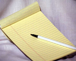 Photo of paper and pen for writing