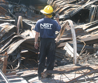 NIST researcher on the site of the warehouse fire.