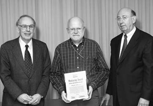 Mentoring Award: Philip Taylor with Joseph Fraumeni and John Niederhuber.