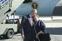 President George W. Bush met Donna Campbell upon arrival in Bellevue, Nebraska, on Monday, October 25, 2004.  Campbell, 64, is an active volunteer with the food program at Messenger of Hope Ministries at the Christian Worship Center in Council Bluffs, Iowa.  