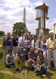 University of Colorado students and professors pose with a wind turbine design they are studying for use in a village in India. 