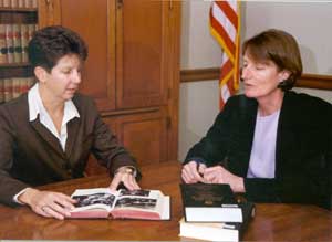 Photo of a Supreme Court Fellow with two judicial interns