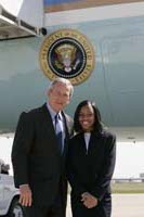 President George W. Bush met Anita Isom, upon arrival in Cleveland, Ohio, on Friday, April 15, 2005.  Isom, a seventh-grader at St. Mary’s Collinwood Catholic School, is actively involved in service projects to promote literacy among youth in low-income areas of Cleveland. 