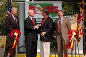 Energy Secretary Samuel Bodman and Maryland Governor Robert Ehrlich shake hands at the opening of Maryland’s first State-owned E-85 fueling facility.