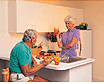 photo of an older couple eating breakfast