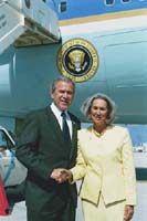 President George W. Bush met Donna Huck upon arrival in Miami, Florida, on Friday, April 23, 2004.  Huck is an active volunteer at the Miami Children’s Hospital.