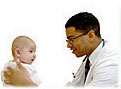Pediatrician examining an infant