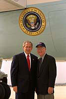President George W. Bush met Richard C. Treadway when he arrived in Naperville, Illinois. Treadway is a retired teacher and an ctive volunteer with the Dupage Children's Museum.