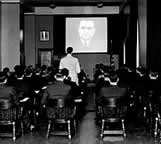 This is a photograph of a new agents training class at the National Academy 
