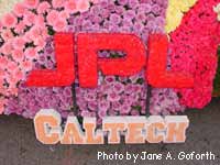 Closeup of JPL/Caltech logos on float.