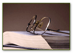 eye glasses resting on a book