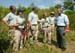 President George W. Bush talks with AmeriCorps volunteers at Rookery Bay National Estuarine Research Reserve in Naples, Fla., Friday, April 22, 2004. "Here at Rookery Bay, you see how important wetlands are to protecting 150 species of birds, and many threatened and endangered animals," said the President in his remarks.