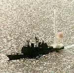Photo of Ship at Sea launching missile