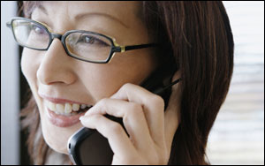 Photo: Woman answering telephone