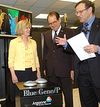 U.S. Rep. Judy Biggert (left), Ray Orbach, the U.S. Department of Energy's Under Secretary for Science, and Argonne National Laboratory Director Robert Rosner prepare to dedicate the Argonne Leadership Computing Facility by running a simulation on the facility's new BlueGene/P supercomputer.