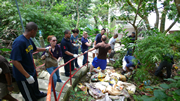 Over 40 U.S. sailors endured Hong Kong's summer heat on Sunday, August 2, while clearing away tons of rocks and debris at the Cham Shan Monastery in Clear Water Bay. The clean-up volunteers are part of the crew of the Navy's USS Paul Hamilton (DDG-60), which was visiting Hong Kong.