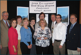Under Secretary Nancy Montanez Johner presented awards to the state staffs of Oklahoma (left) and Arkansas for excellence in the administration of the Food Stamp Program during the 2009 Tri-Regional Food Stamp Program Conference. 