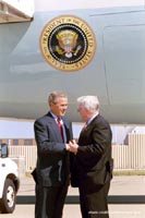 President George W. Bush met Thomas H. Holcom upon arrival in Kansas City, Missouri, on Thursday, September 4, 2003.  For the past eight years, Holcom has been an active volunteer with Angel Flight Central.