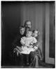  Lorin Wright, brother of Wilbur and Orville, seated holding his children, Horace, Ivonette, and Leontine.
