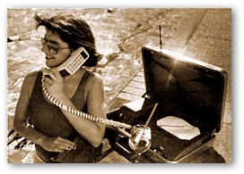 Photos of early mobile phones in a case and in a car - click for more information on early mobile phones