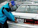 Photo of man entering car