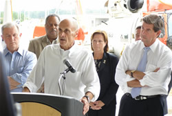 Secretary Chertoff speaking to Coast Guard members and press. With him from left to right: Senator Jeff Sessions; Walter S. Dickerson, Director, Mobile County Emergency Management Agency; Martha Rainville, Counselor to FEMA Administrator and Deputy Administrator; and Governor Bob Riley