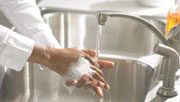 Image, washing hands with warm water and soap