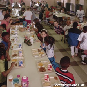 Photo: Students eating lunch in school cafeteria