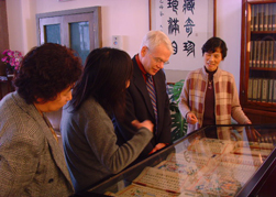 Dr. Killen viewing an exhibit