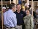 NBC "Today Show" host Matt Lauer talks with President George W. Bush and Laura Bush Tuesday, Oct. 11, 2005, on the construction site of a Habitat for Humanity home in Covington, La., a hurricane-devastated town just north of New Orleans where the nonprofit is building houses for those displaced by Katrina.