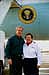 President George W. Bush met Suellen Mayberry upon arrival in San Diego, California, on Tuesday, November 4, 2003. Mayberry, an active volunteer with the American Red Cross, helped establish and relocate an emergency shelter for individuals and families forced to evacuate their homes due to recent California wildfires.