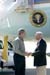 President George W. Bush met Bob Scheidemantel upon arrival in Coraopolis, Pennsylvania, on Wednesday, September 22, 2004.  Scheidemantel, 68, is an active volunteer with the Urban Impact Foundation in Pittsburgh.