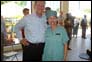 Secretary Mike Leavitt with dentist LCDR Janice Kim at the University Hospital de la Paix in Port-au-Prince, Haiti