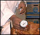 Chef shows proper placement of thermometer in turkey