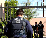 ICE agents sorround the premises