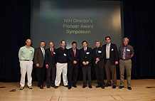 photo of Dr. Zerhouni greeting the 2004 Pioneer Award Recipients