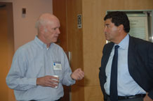 photo of Dr. Zerhouni speaking with Steven McKnight