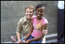 Photo thumbnail: LTJG Stacey McBryde treats a patient at Moulton Hall Methodist School in Port of Spain, Trinidad.