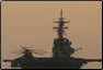 photo thumbnail: Photo from the landing craft utility (LCU) of the Commissioned Corps team re-entering onto the USS Boxer at dusk.