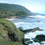 Waves pound against a rugged shoreline in this marine sanctuary.