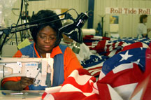 AbilityOne worker sewing a US flag
