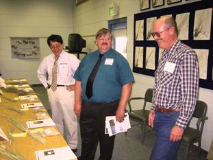 PMC Team Leader, Loren St. John and neighboring ARS scientists discuss PMC accomplishments