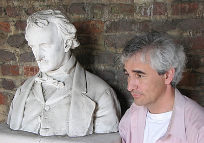 David Kipen mimics the pose next Poe's bust.