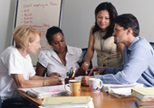 Photo of NIAMS staff in a group meeting