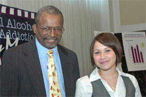 At the 2006 Recovery Month launch on September 7, CSAT Director H. Westley Clark (left) introduced a young woman in recovery from methamphetamine abuse.